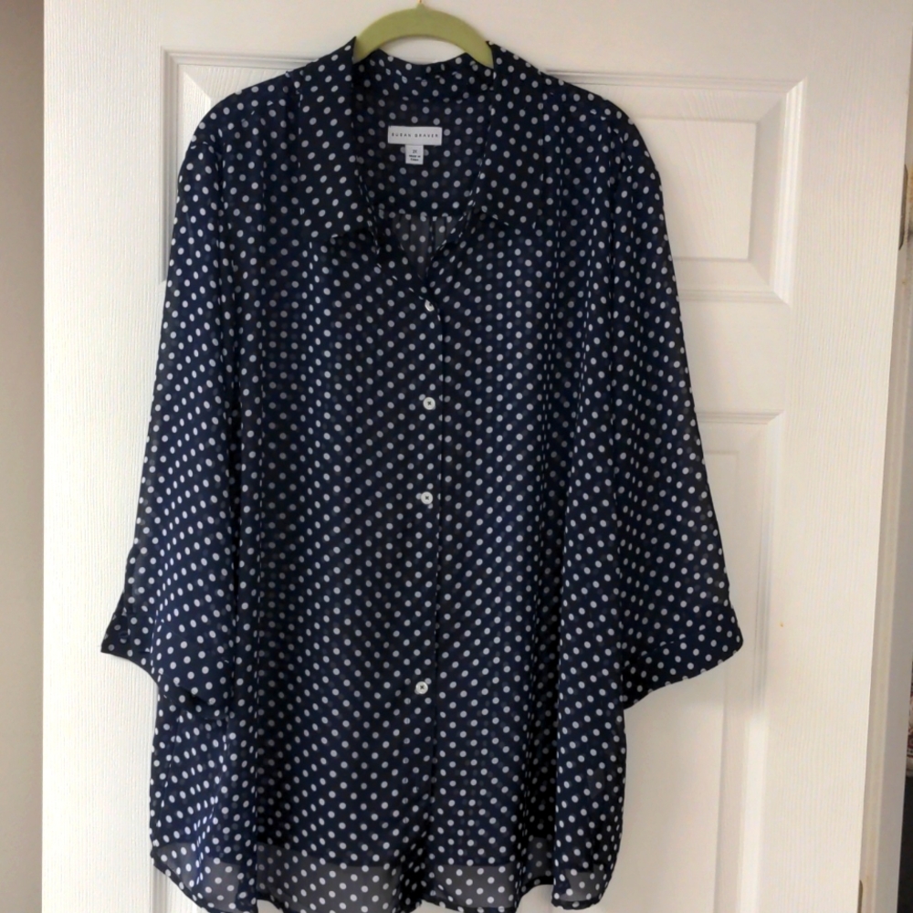 Navy and white polka dot top.